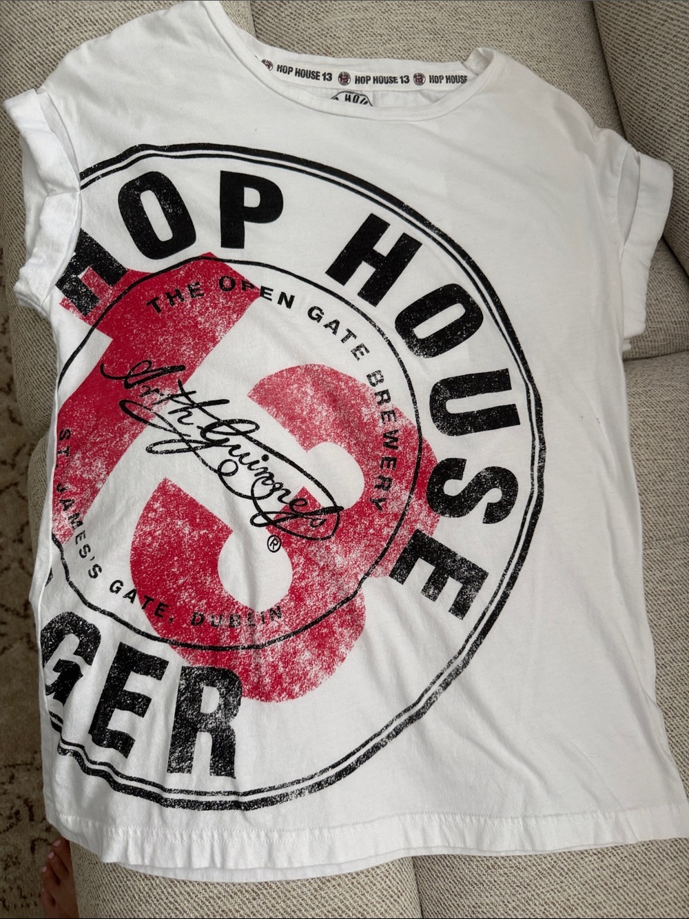 Guinness Women’s White Muscle Tee with Red and Black Graphic